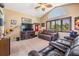 Cozy bonus room featuring a fan, a window with blinds, and Kansas City Chiefs decor at 5029 Camberley Ln, Oldsmar, FL 34677