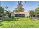 Aberdeen entrance sign surrounded by well-manicured landscaping, iron gates, and palm trees at 5029 Camberley Ln, Oldsmar, FL 34677