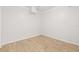 An empty room with wood-look flooring and natural light at 5622 Tangerine S Ave, Gulfport, FL 33707