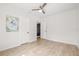 Spare bedroom with ceiling fan and closet at 5622 Tangerine S Ave, Gulfport, FL 33707