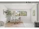 Bright dining area featuring a view of the neighborhood with ample natural light, perfect for relaxed meals at 5622 Tangerine S Ave, Gulfport, FL 33707