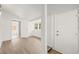 Open hallway with modern floors and neutral paint at 5622 Tangerine S Ave, Gulfport, FL 33707