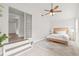 Main bedroom with ceiling fan, natural light and ensuite access at 5622 Tangerine S Ave, Gulfport, FL 33707