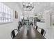 Open-concept dining room seamlessly connects to the kitchen, creating an ideal space for entertaining and Gathering gatherings at 5812 Blossom Ave, Tampa, FL 33614