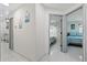 Hallway view leading to bedrooms with tiled floors at 5812 Blossom Ave, Tampa, FL 33614