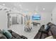 Bright living space with tile floors, coastal decorations, and comfortable seating, creating a welcoming atmosphere at 5812 Blossom Ave, Tampa, FL 33614