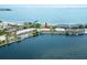 Panoramic aerial view of waterfront condo community featuring lush landscaping and marina access at 611 Destiny Dr, Ruskin, FL 33570