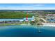 Breathtaking aerial view of a beachfront resort nestled along the coast at 611 Destiny Dr, Ruskin, FL 33570