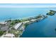 Panoramic aerial view of a waterfront property with lush landscaping and serene waterways at 611 Destiny Dr, Ruskin, FL 33570