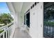 Private balcony with seating, offering picturesque views and a relaxing atmosphere at 611 Destiny Dr, Ruskin, FL 33570