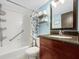 Bathroom with a shower and tub combination and a granite vanity at 611 Destiny Dr, Ruskin, FL 33570