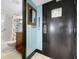 Bathroom with a shower and tub combination with dark cabinets at 611 Destiny Dr, Ruskin, FL 33570