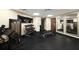 Well-equipped gym with free weights, weight machines, and mirrored walls for a complete workout experience at 611 Destiny Dr, Ruskin, FL 33570