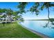 Scenic water view featuring picnic area and lush landscaping at 611 Destiny Dr, Ruskin, FL 33570