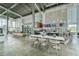 Modern cafe area with high ceilings, contemporary furnishings and snack bar at 6127 Colmar Pl, Apollo Beach, FL 33572
