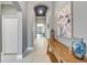 Open-concept foyer with tile flooring leading to living areas at 6127 Colmar Pl, Apollo Beach, FL 33572