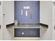 Laundry room with shelf and decor at 6127 Colmar Pl, Apollo Beach, FL 33572