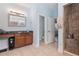 Bright bathroom boasts double vanity, shower, and separate toilet room at 6416 Grenada Island Ave, Apollo Beach, FL 33572