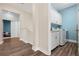Convenient laundry room with white cabinets, modern washer and dryer, and ample counter space at 6416 Grenada Island Ave, Apollo Beach, FL 33572