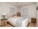 Bright bedroom with a comfortable bed, soft pillows, and neutral tones evokes a peaceful and relaxing ambiance at 7702 New York Dr, Tampa, FL 33619