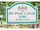 By-Pass Canal Park sign indicating its location in Hillsborough County, Florida at 7702 New York Dr, Tampa, FL 33619