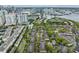 Aerial view of the community in a city featuring tennis courts, and mature trees at 820 Normandy Trace Rd # 820, Tampa, FL 33602