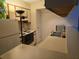 A view of the kitchen with white cabinets, a white refrigerator, and a stainless steel double sink at 9100 Mlk N St # 503, St Petersburg, FL 33702