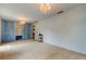 Bedroom features built-in storage and chandelier lighting, providing a cozy and functional space at 9918 Davis Rd, Tampa, FL 33637