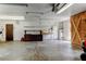 Bright garage space featuring ample storage and functional work area with natural lighting at 9918 Davis Rd, Tampa, FL 33637
