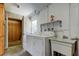 Laundry room with washer, dryer, and sink at 9918 Davis Rd, Tampa, FL 33637