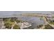 Overhead view of a marina with a picturesque cityscape, bridge, and various boats docked along the waterfront at 1 Beach Se Dr # 2011, St Petersburg, FL 33701