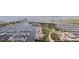 Aerial view overlooking the marina showcasing the stunning waterfront and docked boats, surrounded by lush greenery at 1 Beach Se Dr # 2011, St Petersburg, FL 33701