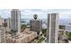 A scenic aerial view of a waterfront building surrounded by stunning skyline and glistening blue waters at 1 Beach Se Dr # 2011, St Petersburg, FL 33701
