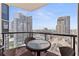 Balcony seating area overlooking cityscape with views of surrounding high-rise buildings at 1 Beach Se Dr # 2011, St Petersburg, FL 33701