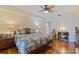 Bedroom featuring a warm color palette, hardwood floors and ample natural light at 1 Beach Se Dr # 2011, St Petersburg, FL 33701