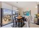 Bright dining area features a large window with city views and an adjacent breakfast bar at 1 Beach Se Dr # 2011, St Petersburg, FL 33701