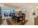 Spacious dining room with a large table and chairs, leading to an open living area with expansive city views at 1 Beach Se Dr # 2011, St Petersburg, FL 33701