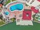 Aerial view of the waterfront condo community pool, spa, and dock area at 105 Island Way # 126, Clearwater Beach, FL 33767