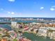 Aerial view of condos that feature waterfront living close to local amenities at 105 Island Way # 126, Clearwater Beach, FL 33767