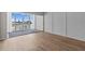 Living room showing balcony access with a view of the intercoastal waterways at 105 Island Way # 126, Clearwater Beach, FL 33767