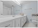 Bathroom with extended vanity, drawers and cabinets plus a shower/tub combo at 105 Island Way # 126, Clearwater Beach, FL 33767