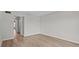 Bright bedroom features wood flooring and a neutral paint scheme at 105 Island Way # 126, Clearwater Beach, FL 33767