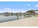 Dock extending into the canal showing view of waterfront properties at 105 Island Way # 126, Clearwater Beach, FL 33767