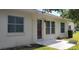 Exterior view of residence, showing the back facade and windows at 11541 Orleans Ln, Port Richey, FL 34668