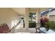 Inviting patio with comfortable seating and lush landscaping at 11541 Orleans Ln, Port Richey, FL 34668