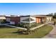 Modern community building boasts stylish architecture, well-kept landscaping, and inviting entrance at 11551 Callisia Dr, Odessa, FL 33556