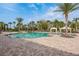 The community pool includes ample lounge chairs and poolside cabanas, offering a luxurious and relaxing outdoor experience at 11551 Callisia Dr, Odessa, FL 33556
