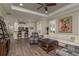 Open-concept living area seamlessly connects to the kitchen, creating a bright and inviting space at 11551 Callisia Dr, Odessa, FL 33556