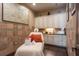 This spa room offers a relaxing space with soft lighting and ample storage, providing the perfect retreat at 11551 Callisia Dr, Odessa, FL 33556