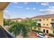 Wide angle from balcony showing the buildings, trees and car park at 119 Beach Haven Ln, Tampa, FL 33609